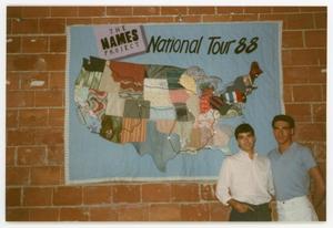 Primary view of object titled '[Two Men in Front of Quilted Tour Map]'.