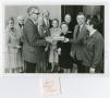 Photograph: [Several Unidentified People at History Presentation]