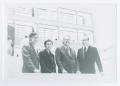 Photograph: [Four Men Posing in Front of a Building]