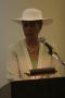 Thumbnail image of item number 1 in: '[Woman in white hat standing at podium]'.