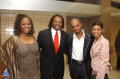 Photograph: [Curtis King, Regina Taylor, and Kirk Franklin with Guest]