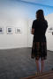 Thumbnail image of item number 1 in: '[Woman in Dress looking at Artwork]'.
