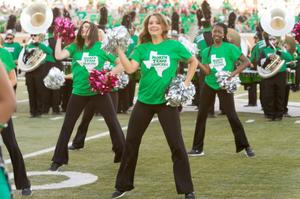Primary view of object titled '[North Texas Dancers Perform at Homecoming Game]'.