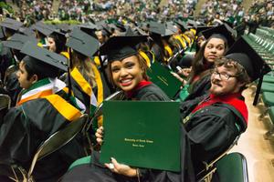 Primary view of object titled '[Students at UNT Commencement 2015]'.