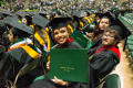 Thumbnail image of item number 1 in: '[Students at UNT Commencement 2015]'.