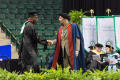 Primary view of [Male Graduate Student Shaking Hands with Dean]