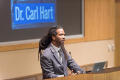 Photograph: [Dr. Carl Hart Presenting at Conference]