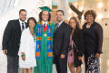 Photograph: [Undergraduate student and his family at commencement]