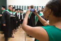 Thumbnail image of item number 1 in: '[Students backstage at Commencement]'.