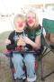 Photograph: [Mother and Child Wearing Red Clown Noses]