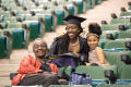 Photograph: [Masters Graduate with Family]