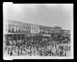 Primary view of [A funeral in the Denton square]