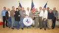 Primary view of [Arlington Chapter Members Holding TXSSAR Seal]