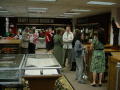 Primary view of [Reception Guests in the Rare Books Room]