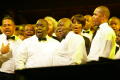 Photograph: [Choir members on stage]