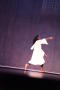 Photograph: [Solo dancer in white on stage]