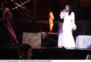 Primary view of object titled '[Actress performs solo in Aretha: The Musical]'.