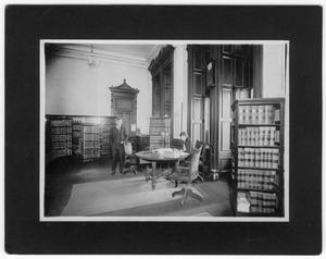 Primary view of object titled '[Unidentified Man and Woman in Law Office]'.