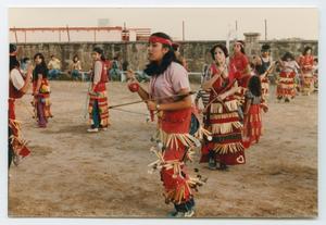 [People Doing Native American Ceremonial Dance]