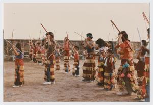 [People Wearing Native American Ceremonial Clothing]
