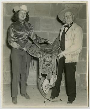 [Photograph of Sam Myres with the champion cowgirl of El Paso]