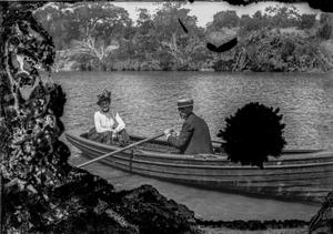 Primary view of object titled '[Woman and Man in Canoe]'.