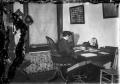 Photograph: [Woman Working at Desk]