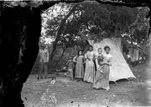 Primary view of object titled '[Family Portrait in Front of Tent]'.