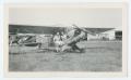 Photograph: [Two Women with Plane]