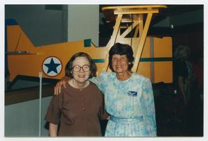 Primary view of object titled '[Joy Krieger and Friend with Plane Model]'.