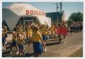 Photograph: [Drill Team Marching in Front of Boyer Burger]