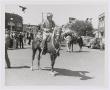 Photograph: [Unidentified Man Rides a Horse]