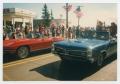 Photograph: [Cars in Fourth of July parade]