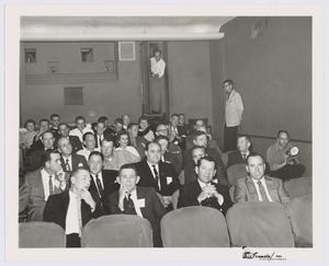 [Group of People Inside Motion Picture Theatre]