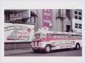 Photograph: ["Movie Time in Texas" tour bus in front of Majestic Theatre]