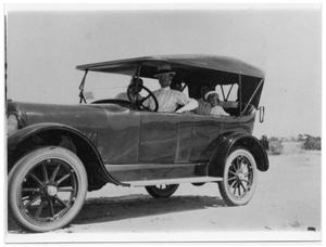 Primary view of object titled 'Family in Velie Brand Automobile'.