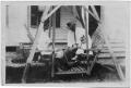 Photograph: [Lillie Dew in a Glider Swing]