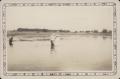 Photograph: [Photograph of a Baptism at Fulshear Lake]