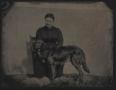 Photograph: [Photograph of a Woman and a Dog]