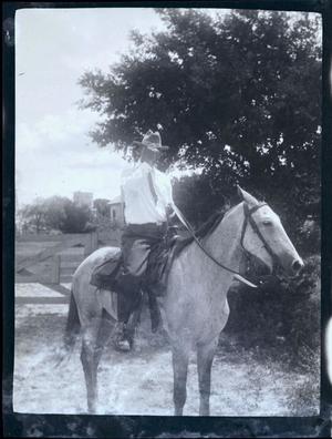 [Photograph of a Man on a Horse]