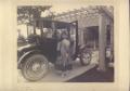 Photograph: [Woman in Front of Car]