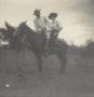 Photograph: [Photograph of a Couple on a Horse]
