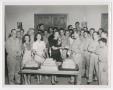 Photograph: [Group Celebrating with Cake]