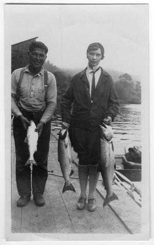 [Mrs. John Winthrop Barnes and Unidentified Man with Fish]