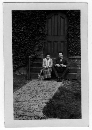 Primary view of object titled '[Miss Guthrie and an Unidentified Man Sitting on Steps at the Va. Seminary]'.