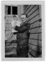 Photograph: [Unidentified Man Holding a Baby]
