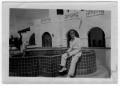 Photograph: [Unidentified Man and a Fountain]