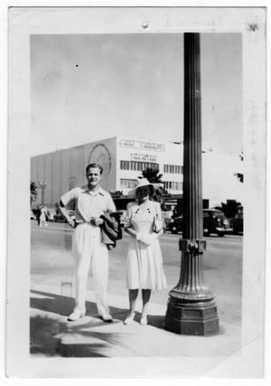 [Unidentified Couple Standing in front of the Earl Carroll Theatre]