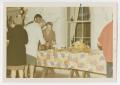 Primary view of [Mrs. D. B. Gregg Serving Guests]