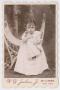 Photograph: [Child with Doll]